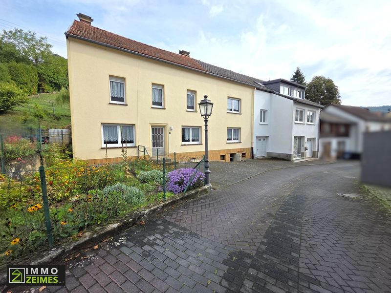 Zwei Häuser zum Preis von einem – vielseitiges Immobilienangebot in ruhiger Seitenstraße